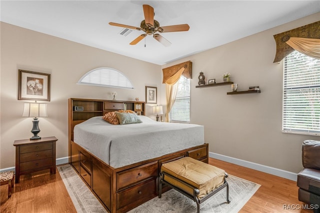 bedroom featuring ceiling fan and light hardwood / wood-style floors