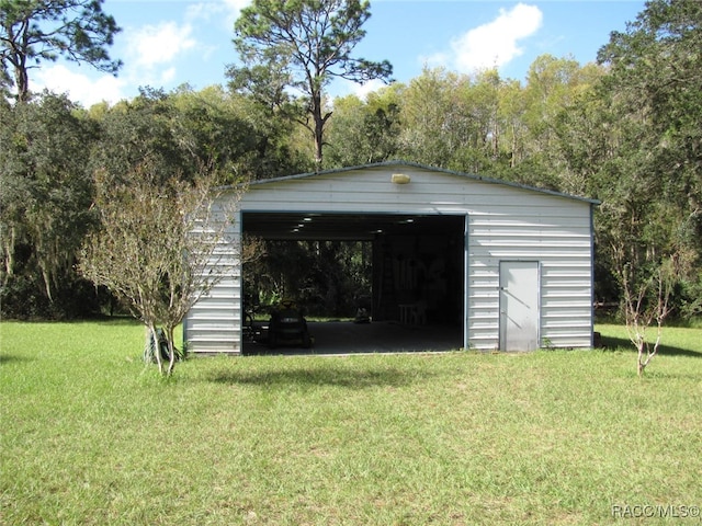 view of outdoor structure with a lawn