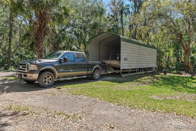 view of outdoor structure with a carport