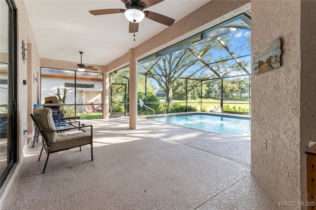 view of pool with ceiling fan