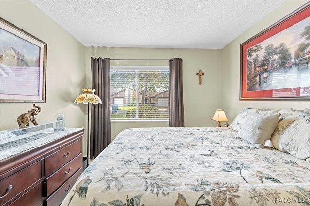 bedroom featuring a textured ceiling