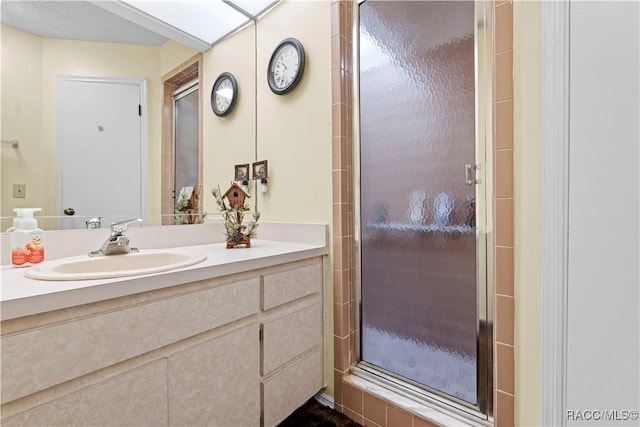 bathroom featuring vanity and walk in shower