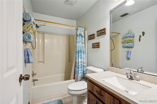 bathroom featuring visible vents, tile patterned flooring, shower / tub combo, vanity, and toilet