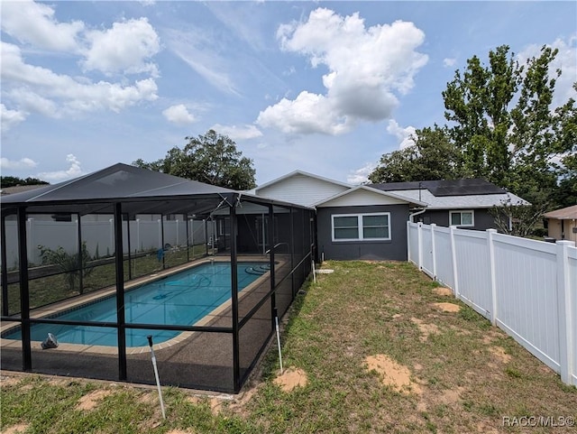 view of pool featuring a lanai