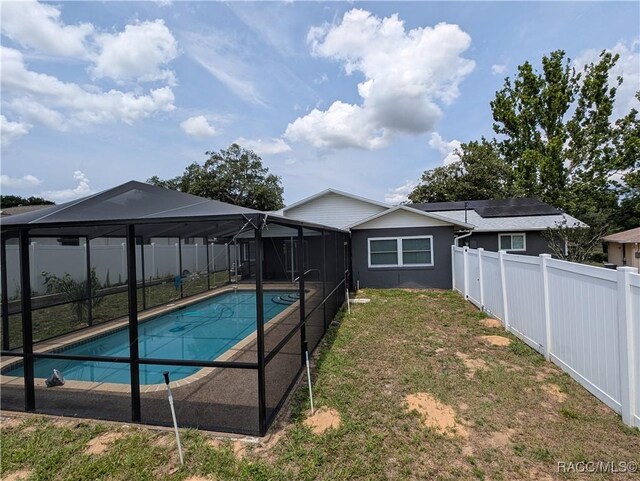 view of pool featuring a lanai