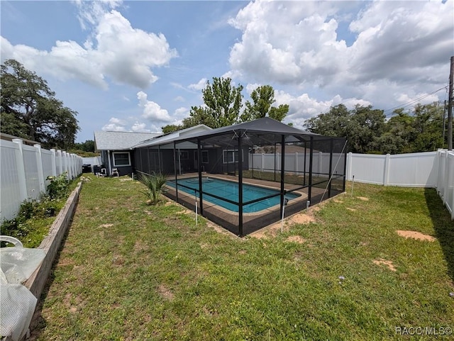 view of swimming pool with glass enclosure