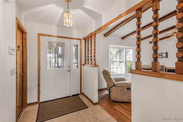 entrance foyer with light tile patterned floors