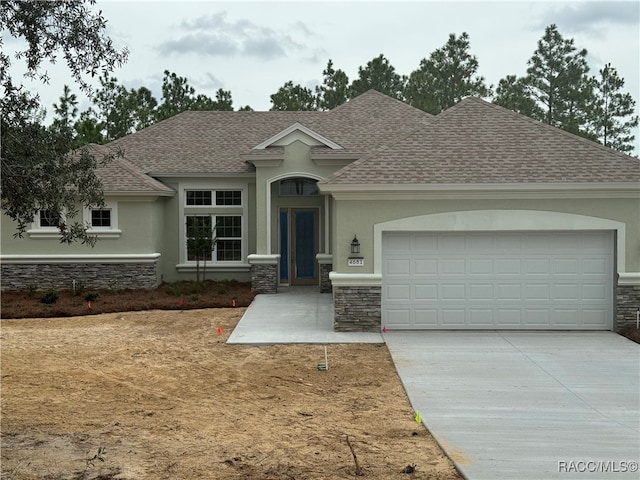 view of front of house with a garage