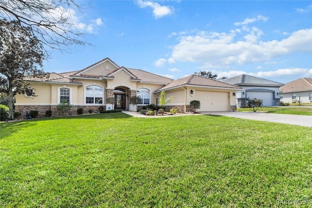 view of front facade with a garage and a front lawn