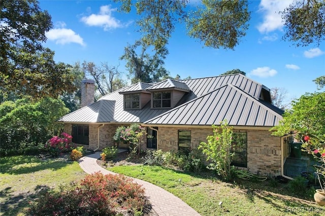 view of front of house with a front lawn