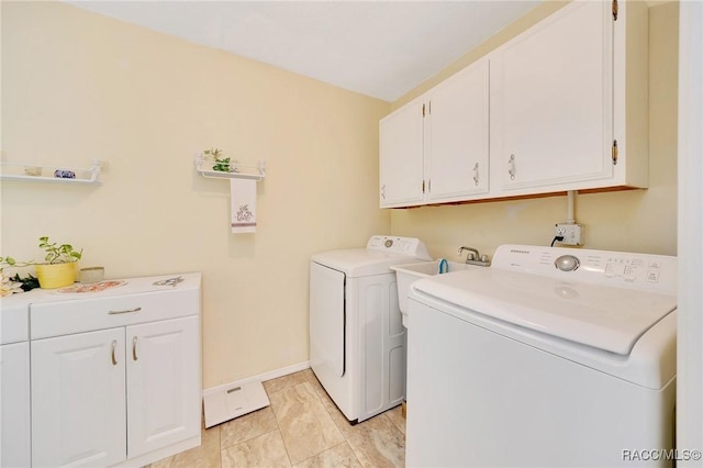 66 S Desoto St, Beverly Hills, FL 34465 - laundry room featuring cabinet space, independent washer and dryer, and baseboards