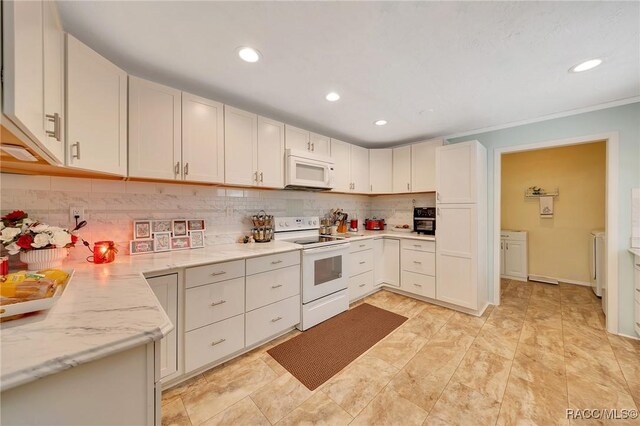 66 S Desoto St, Beverly Hills, FL 34465 - kitchen with white appliances, washer and dryer, decorative backsplash, and recessed lighting