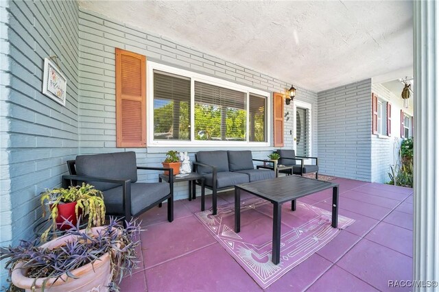 66 S Desoto St, Beverly Hills, FL 34465 - wooden porch with an outdoor hangout area