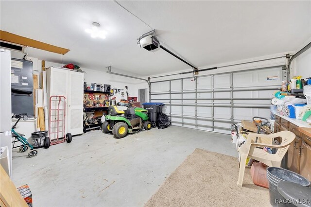 66 S Desoto St, Beverly Hills, FL 34465 - garage with a garage door opener