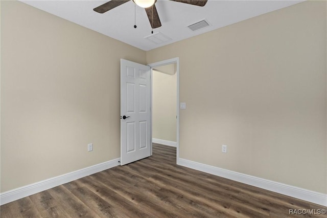 977 W Homeway Loop, Citrus Springs, FL 34434 - empty room featuring ceiling fan and dark wood-type flooring