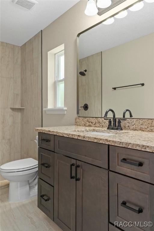 977 W Homeway Loop, Citrus Springs, FL 34434 - bathroom featuring tiled shower and vanity