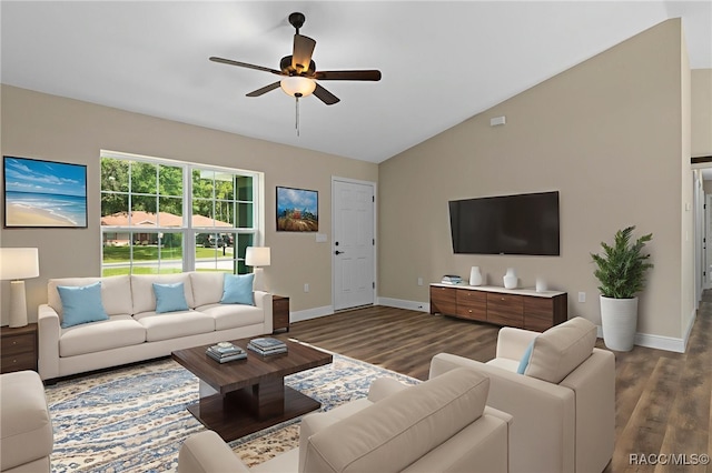 977 W Homeway Loop, Citrus Springs, FL 34434 - living area featuring lofted ceiling, wood finished floors, and ceiling fan