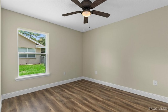 977 W Homeway Loop, Citrus Springs, FL 34434 - unfurnished room featuring dark wood-style flooring and a ceiling fan