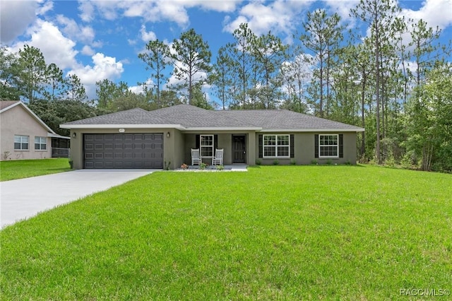 977 W Homeway Loop, Citrus Springs, FL 34434 - single story home with driveway, an attached garage, a front yard, stucco siding, and covered porch