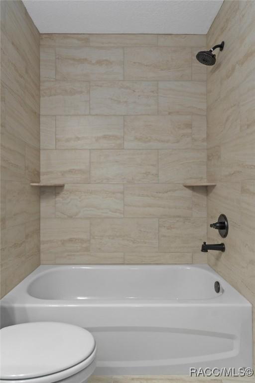 977 W Homeway Loop, Citrus Springs, FL 34434 - full bathroom with toilet and shower / washtub combination