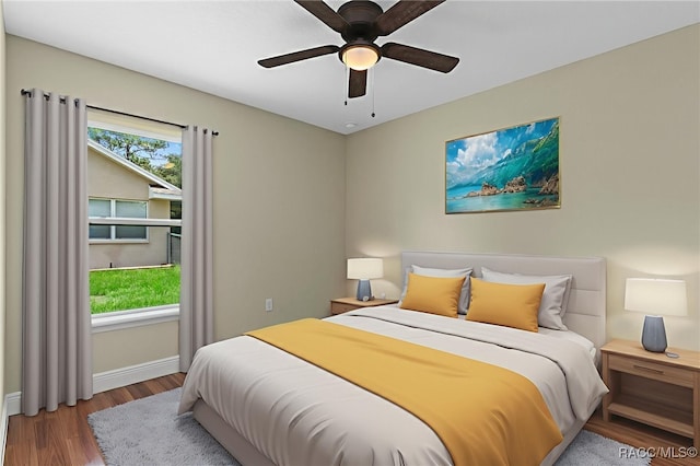 977 W Homeway Loop, Citrus Springs, FL 34434 - bedroom featuring wood finished floors and ceiling fan
