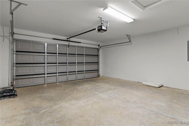 977 W Homeway Loop, Citrus Springs, FL 34434 - garage featuring a garage door opener, concrete block wall, and electric panel