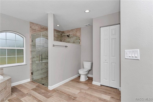 5443 N Nakoma Dr, Beverly Hills, FL 34465 - bathroom with a closet, a stall shower, a garden tub, and recessed lighting
