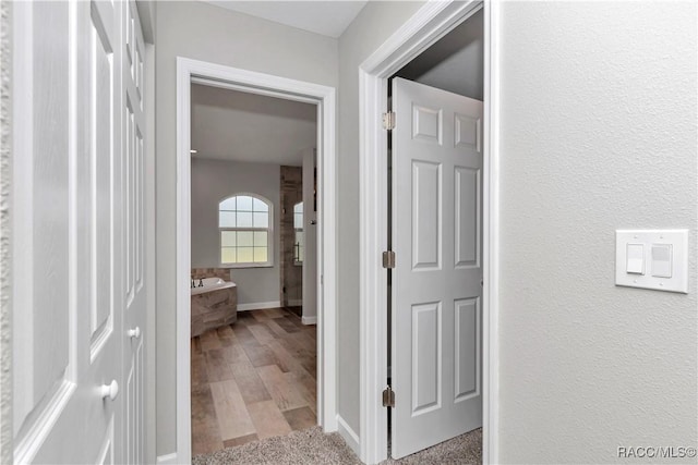 5443 N Nakoma Dr, Beverly Hills, FL 34465 - hallway featuring baseboards