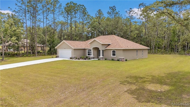 5443 N Nakoma Dr, Beverly Hills, FL 34465 - single story home with driveway, a front yard, stucco siding, and a garage
