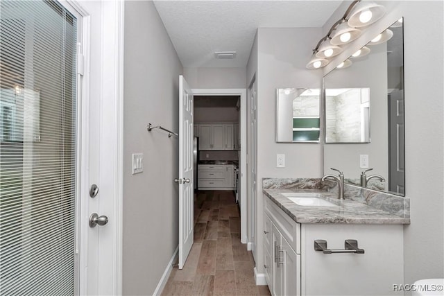5443 N Nakoma Dr, Beverly Hills, FL 34465 - full bathroom with vanity, a closet, and wood finished floors
