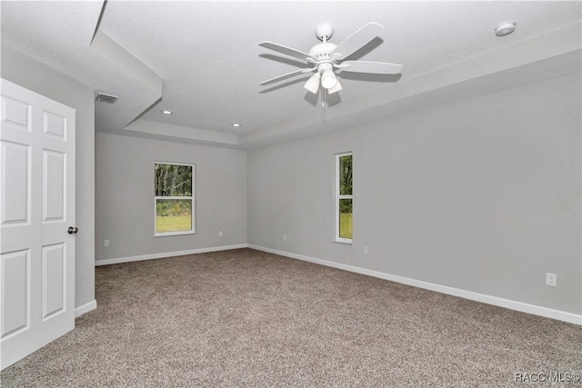 5443 N Nakoma Dr, Beverly Hills, FL 34465 - unfurnished room with carpet, a tray ceiling, a ceiling fan, healthy amount of natural light, and recessed lighting
