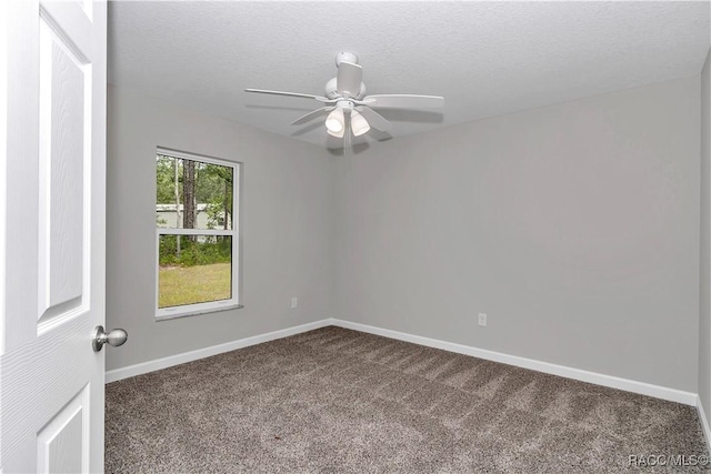 5443 N Nakoma Dr, Beverly Hills, FL 34465 - unfurnished room featuring dark colored carpet, ceiling fan, and a textured ceiling