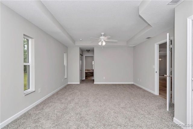 5443 N Nakoma Dr, Beverly Hills, FL 34465 - unfurnished room with carpet floors, a ceiling fan, and a raised ceiling