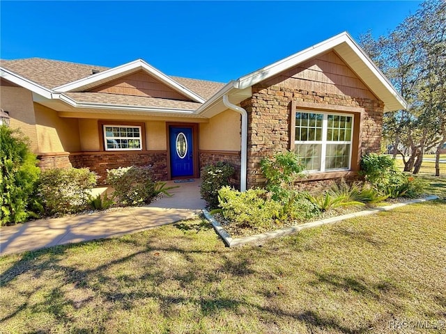 view of front of home with a front yard