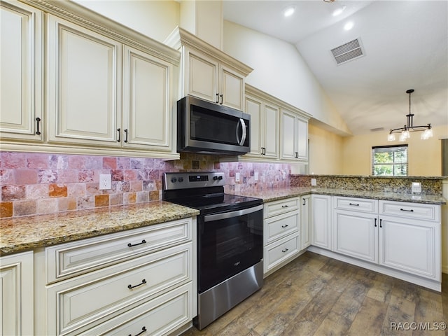 kitchen with hanging light fixtures, stainless steel appliances, tasteful backsplash, dark hardwood / wood-style floors, and lofted ceiling