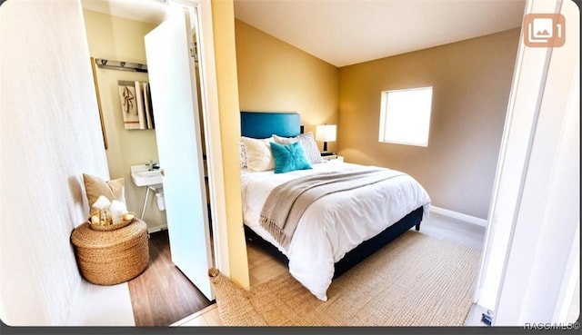bedroom featuring baseboards