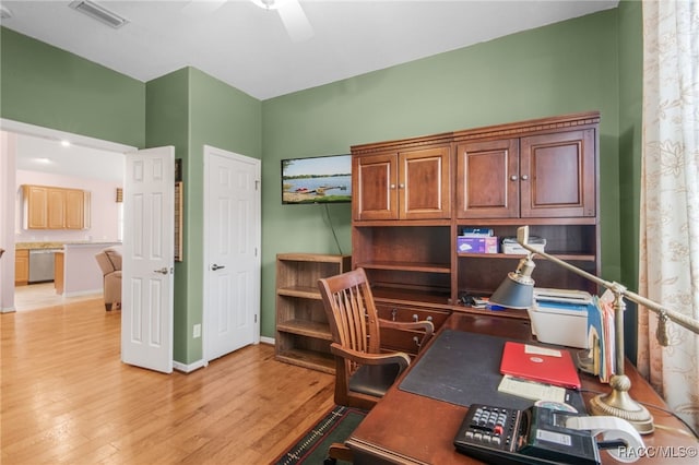 office area with ceiling fan and light hardwood / wood-style flooring