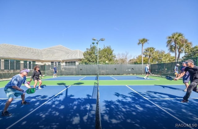 view of tennis court with basketball court