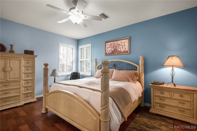 bedroom featuring dark wood-type flooring and ceiling fan