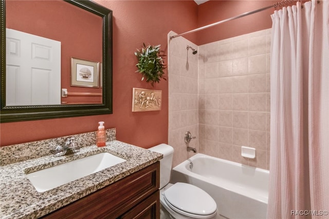 full bathroom with shower / bathtub combination with curtain, vanity, and toilet