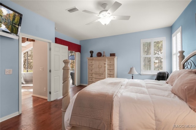 bedroom featuring dark wood-type flooring and ceiling fan