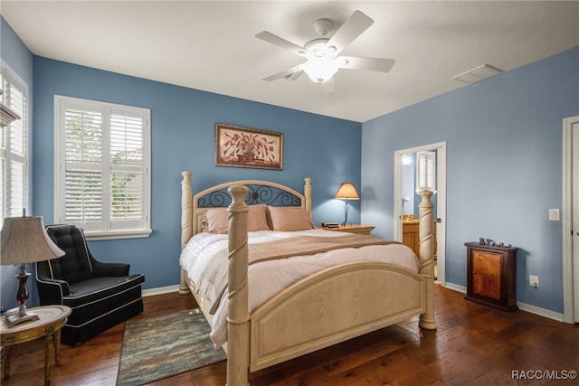 bedroom with dark wood-type flooring and ceiling fan