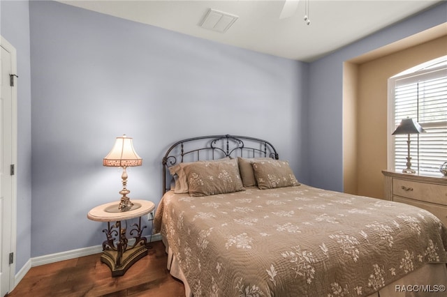 bedroom with wood-type flooring