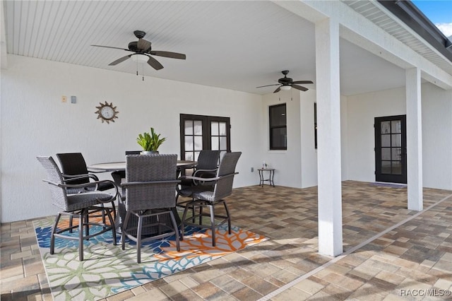 view of patio featuring ceiling fan