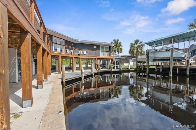 dock area with a water view