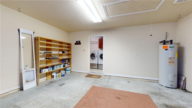 garage with separate washer and dryer and water heater