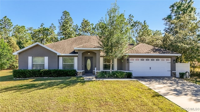 single story home featuring a front yard and a garage