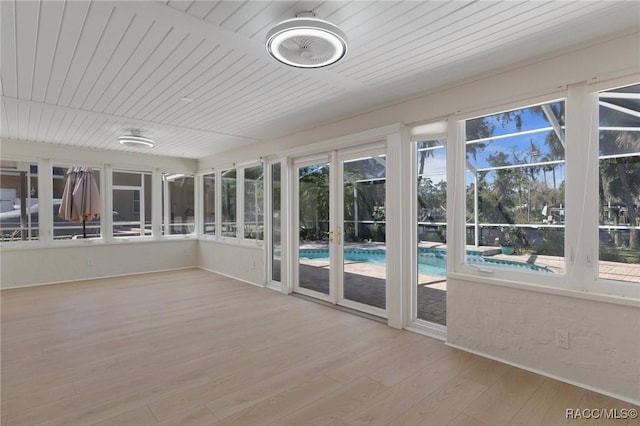 unfurnished sunroom featuring wooden ceiling