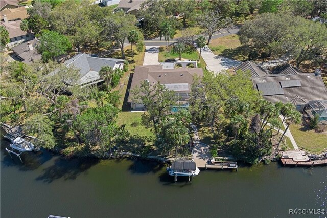 bird's eye view featuring a water view and a residential view