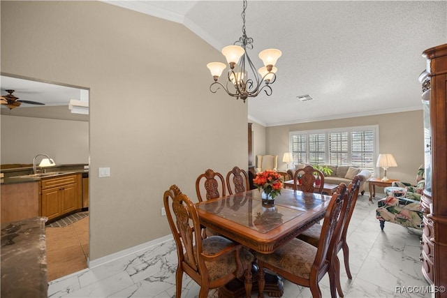 dining space featuring marble finish floor, baseboards, and crown molding